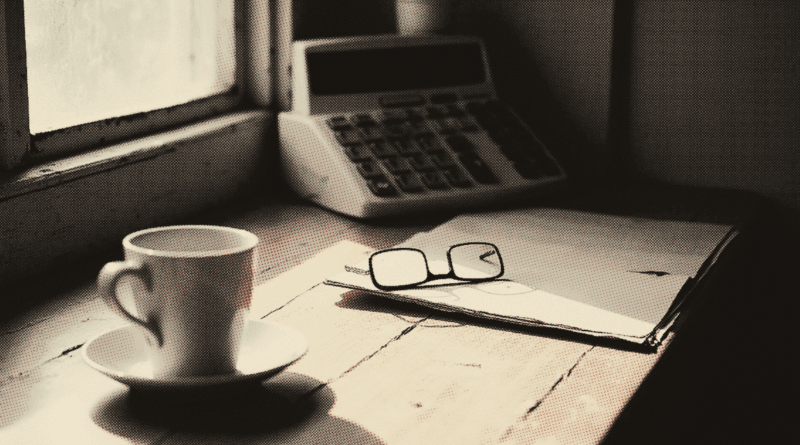 A wooden desk beside a window in the morning — Income Tax Relief Malaysia 2026: Full List & Who Must File