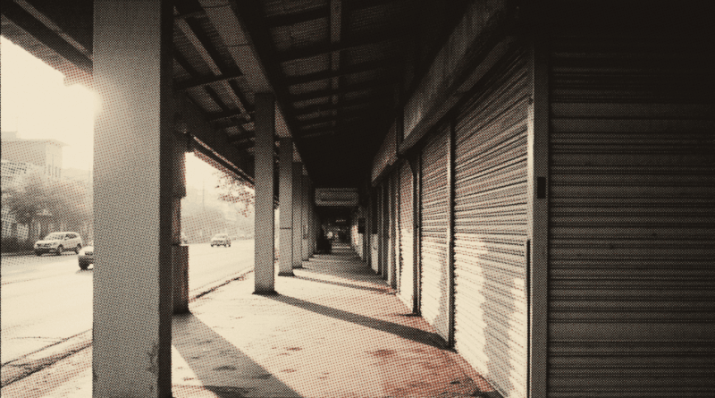 A row of ground-floor shophouse offices seen from under the covered five-foot-way at dawn — SSM Registration Online 2026: Enterprise vs Sdn Bhd & Fees