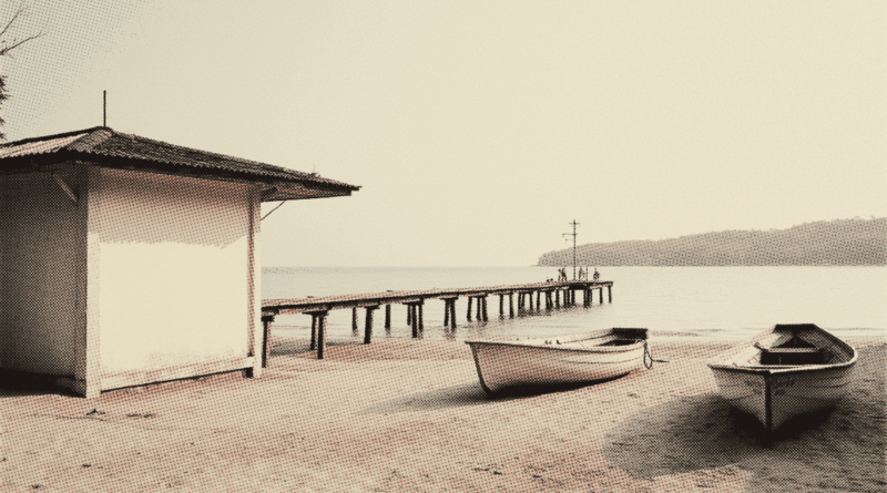 An empty beach at dawn with a low timber jetty running out into flat calm water — Langkawi Travel Guide 2026: Cable Car Price, Duty-Free & Hidden Gems