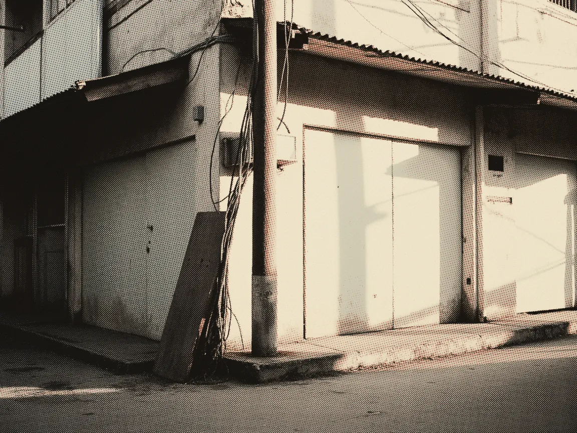 Best Home Fibre Broadband Malaysia 2026: Price & Speed — a back lane utility pole with a bundle of cables looping away