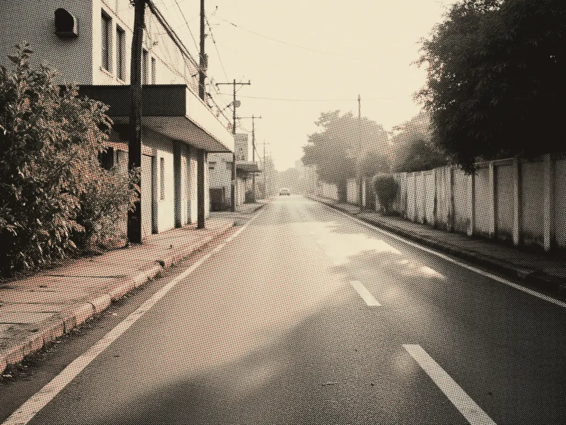 KEJARA Demerit Points Malaysia 2026: Check & Suspension — an empty suburban road at dawn with no vehicle in sight