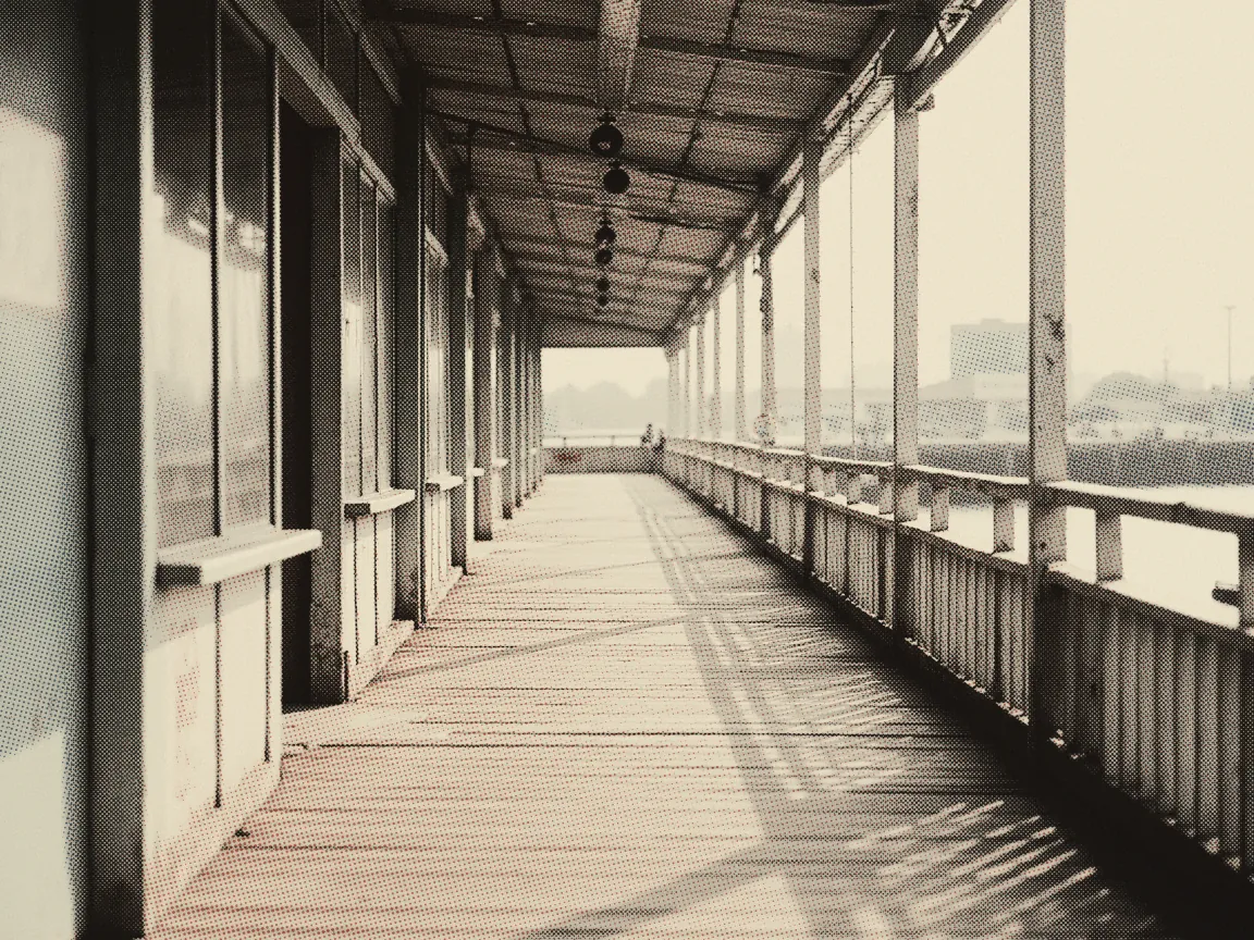 Langkawi Travel Guide 2026: Cable Car Price, Duty-Free & Hidden Gems — an empty jetty walkway over calm water with a mooring bollard