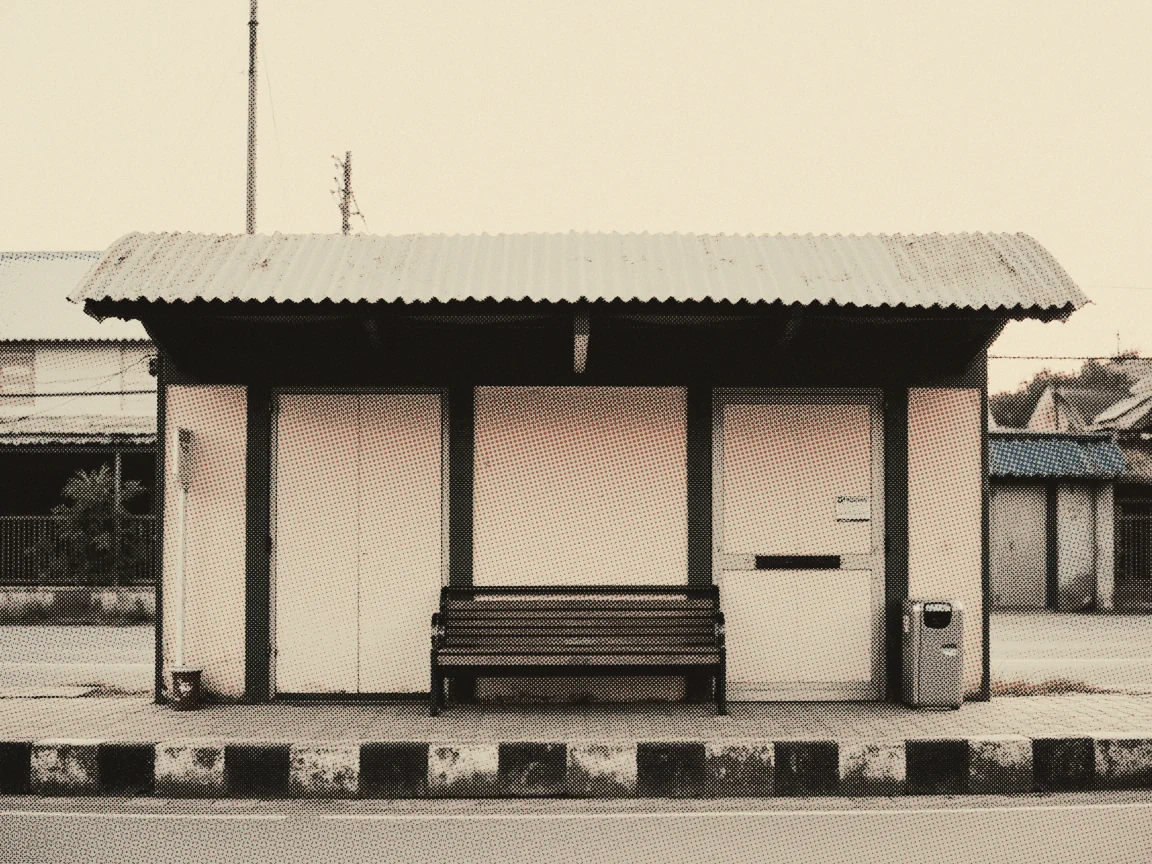 Senior Citizen Benefits Malaysia 2026: BWE, Fees, Cards — an empty roadside bus shelter with a bench, waiting
